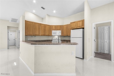 This stunning 4-bedroom, 2.5-bath waterfront pool home is on Burnt Store Golf Club in Florida - for sale on GolfHomes.com, golf home, golf lot