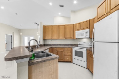 This stunning 4-bedroom, 2.5-bath waterfront pool home is on Burnt Store Golf Club in Florida - for sale on GolfHomes.com, golf home, golf lot