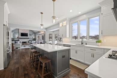 Nestled in a superior cul-de-sac location within the prestigious on Eagle Brook Country Club in Illinois - for sale on GolfHomes.com, golf home, golf lot