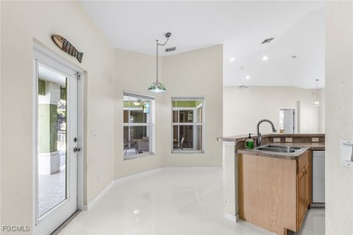 This stunning 4-bedroom, 2.5-bath waterfront pool home is on Burnt Store Golf Club in Florida - for sale on GolfHomes.com, golf home, golf lot