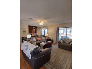 Check out this beautifully updated 2-bedroom, 2-bath home in the on Heron Point Golf Club in South Carolina - for sale on GolfHomes.com, golf home, golf lot