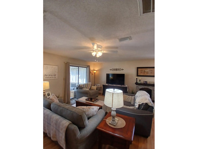 Check out this beautifully updated 2-bedroom, 2-bath home in the on Heron Point Golf Club in South Carolina - for sale on GolfHomes.com, golf home, golf lot