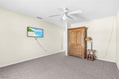 This stunning 4-bedroom, 2.5-bath waterfront pool home is on Burnt Store Golf Club in Florida - for sale on GolfHomes.com, golf home, golf lot