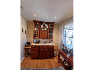 Check out this beautifully updated 2-bedroom, 2-bath home in the on Heron Point Golf Club in South Carolina - for sale on GolfHomes.com, golf home, golf lot