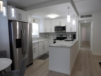 Welcome to this beautifully updated 2-bedroom & 2-bath first on Kings Point Golf -Flanders Way in Florida - for sale on GolfHomes.com, golf home, golf lot