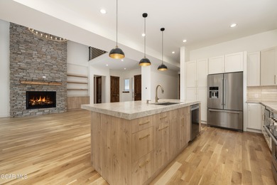 This Mountain Chic home is all about the views ! With windows on Headwaters Golf Course At Granby Ranch in Colorado - for sale on GolfHomes.com, golf home, golf lot