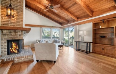 Soaring cedar ceilings, an abundance of natural light, and on The Dunedin Country Club in Florida - for sale on GolfHomes.com, golf home, golf lot