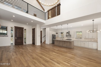 This Mountain Chic home is all about the views ! With windows on Headwaters Golf Course At Granby Ranch in Colorado - for sale on GolfHomes.com, golf home, golf lot