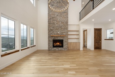 This Mountain Chic home is all about the views ! With windows on Headwaters Golf Course At Granby Ranch in Colorado - for sale on GolfHomes.com, golf home, golf lot