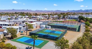 Private retreat backing to the barranca in Riverview RV Resort on Riverview Golf Course in Arizona - for sale on GolfHomes.com, golf home, golf lot