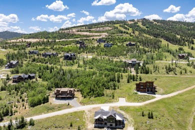 This 0.76-acre lot ski in ski out homesite is nestled among on Headwaters Golf Course At Granby Ranch in Colorado - for sale on GolfHomes.com, golf home, golf lot