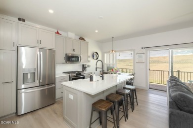 Discover this fully furnished, move-in-ready 1,360 sqft on Grand Elk Ranch and Club in Colorado - for sale on GolfHomes.com, golf home, golf lot