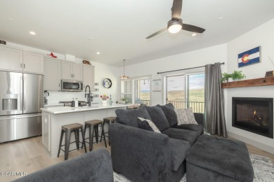 Discover this fully furnished, move-in-ready 1,360 sqft on Grand Elk Ranch and Club in Colorado - for sale on GolfHomes.com, golf home, golf lot