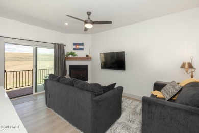 Discover this fully furnished, move-in-ready 1,360 sqft on Grand Elk Ranch and Club in Colorado - for sale on GolfHomes.com, golf home, golf lot