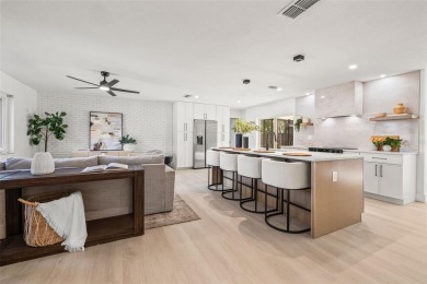Beautifully renovated, this 3 bed, 2 bath home has over 1,600 on Countryside Country Club in Florida - for sale on GolfHomes.com, golf home, golf lot