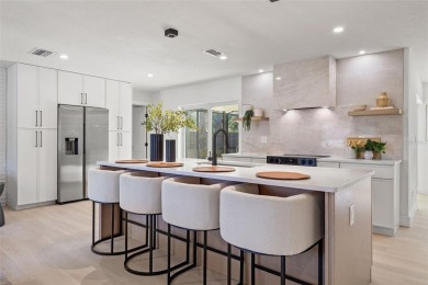 Beautifully renovated, this 3 bed, 2 bath home has over 1,600 on Countryside Country Club in Florida - for sale on GolfHomes.com, golf home, golf lot