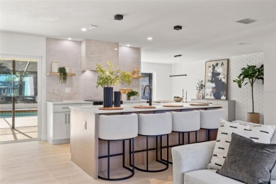 Beautifully renovated, this 3 bed, 2 bath home has over 1,600 on Countryside Country Club in Florida - for sale on GolfHomes.com, golf home, golf lot