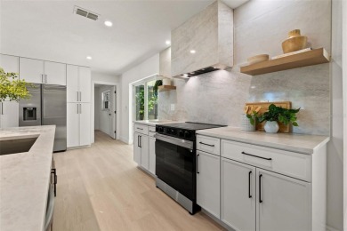 Beautifully renovated, this 3 bed, 2 bath home has over 1,600 on Countryside Country Club in Florida - for sale on GolfHomes.com, golf home, golf lot