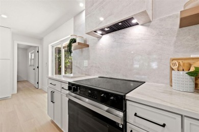 Beautifully renovated, this 3 bed, 2 bath home has over 1,600 on Countryside Country Club in Florida - for sale on GolfHomes.com, golf home, golf lot