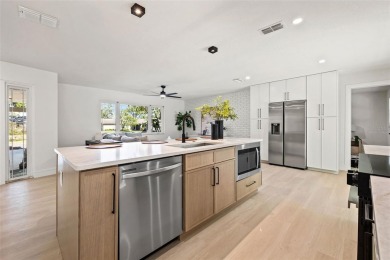 Beautifully renovated, this 3 bed, 2 bath home has over 1,600 on Countryside Country Club in Florida - for sale on GolfHomes.com, golf home, golf lot
