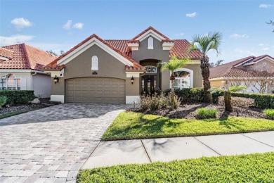 Welcome to this EXQUISITE CUSTOM-DESIGNED home situated within on Cheval Golf and Country Club in Florida - for sale on GolfHomes.com, golf home, golf lot