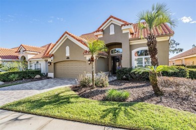 Welcome to this EXQUISITE CUSTOM-DESIGNED home situated within on Cheval Golf and Country Club in Florida - for sale on GolfHomes.com, golf home, golf lot