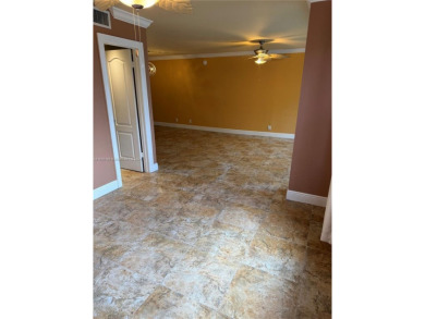 2/2 well-kept unit w/ screened-in patio & water view. Marble on Pine Island Ridge Country Club in Florida - for sale on GolfHomes.com, golf home, golf lot