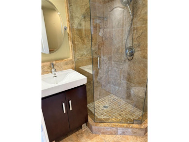 2/2 well-kept unit w/ screened-in patio & water view. Marble on Pine Island Ridge Country Club in Florida - for sale on GolfHomes.com, golf home, golf lot