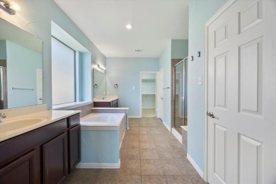 MOVE IN READY HOME ON GOLF COURSE WITH LAKE VIEWS! Welcome to on The Shores Country Club in Texas - for sale on GolfHomes.com, golf home, golf lot