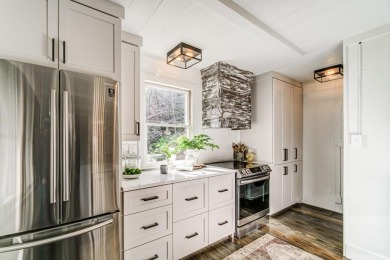 This Big Canoe Plummer cabin showstopper has 3 BR & 2.5 BA (with on Big Canoe Golf Club - Cherokee in Georgia - for sale on GolfHomes.com, golf home, golf lot