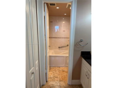 2/2 well-kept unit w/ screened-in patio & water view. Marble on Pine Island Ridge Country Club in Florida - for sale on GolfHomes.com, golf home, golf lot