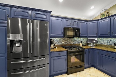 Prepare to be enchanted by this exquisite 3/2 GOLF FRONT Lantana on The Links of Spruce Creek in Florida - for sale on GolfHomes.com, golf home, golf lot