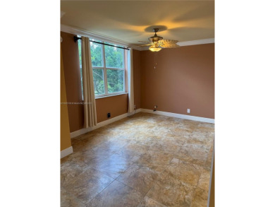 2/2 well-kept unit w/ screened-in patio & water view. Marble on Pine Island Ridge Country Club in Florida - for sale on GolfHomes.com, golf home, golf lot