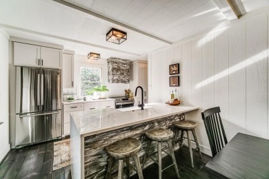 This Big Canoe Plummer cabin showstopper has 3 BR & 2.5 BA (with on Big Canoe Golf Club - Cherokee in Georgia - for sale on GolfHomes.com, golf home, golf lot