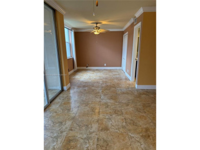 2/2 well-kept unit w/ screened-in patio & water view. Marble on Pine Island Ridge Country Club in Florida - for sale on GolfHomes.com, golf home, golf lot