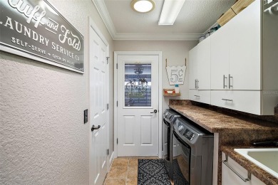Prepare to be enchanted by this exquisite 3/2 GOLF FRONT Lantana on The Links of Spruce Creek in Florida - for sale on GolfHomes.com, golf home, golf lot
