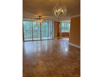 2/2 well-kept unit w/ screened-in patio & water view. Marble on Pine Island Ridge Country Club in Florida - for sale on GolfHomes.com, golf home, golf lot