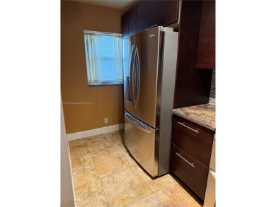 2/2 well-kept unit w/ screened-in patio & water view. Marble on Pine Island Ridge Country Club in Florida - for sale on GolfHomes.com, golf home, golf lot
