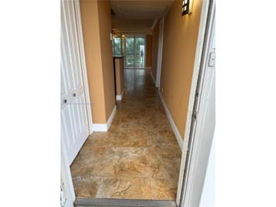 2/2 well-kept unit w/ screened-in patio & water view. Marble on Pine Island Ridge Country Club in Florida - for sale on GolfHomes.com, golf home, golf lot