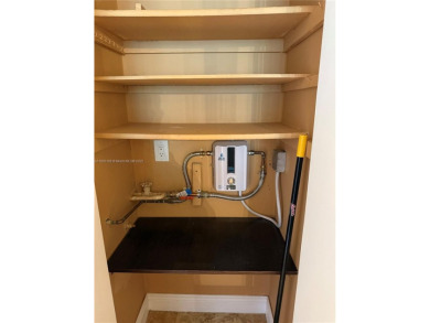 2/2 well-kept unit w/ screened-in patio & water view. Marble on Pine Island Ridge Country Club in Florida - for sale on GolfHomes.com, golf home, golf lot