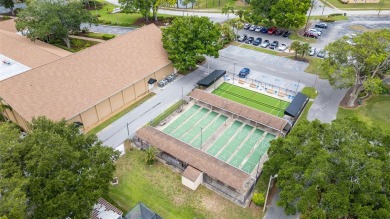 Under contract-accepting backup offers. Charming 2BR/2BA Single on Highland Lakes Executive Golf Course in Florida - for sale on GolfHomes.com, golf home, golf lot