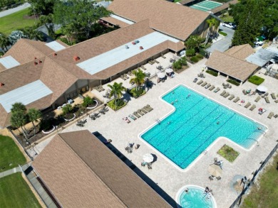 Under contract-accepting backup offers. Charming 2BR/2BA Single on Highland Lakes Executive Golf Course in Florida - for sale on GolfHomes.com, golf home, golf lot