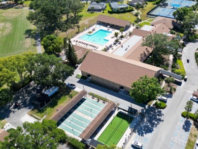 Under contract-accepting backup offers. Charming 2BR/2BA Single on Highland Lakes Executive Golf Course in Florida - for sale on GolfHomes.com, golf home, golf lot