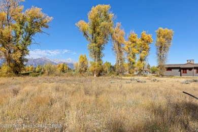 Enjoy beautiful Grand Teton views from this premier .84 acre lot on Jackson Hole Golf and Tennis Club in Wyoming - for sale on GolfHomes.com, golf home, golf lot