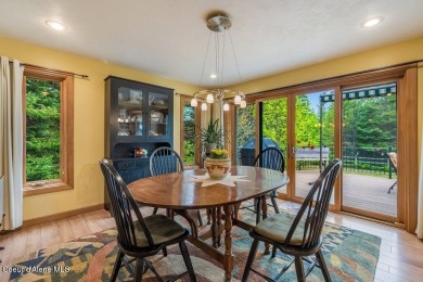 This impeccably maintained Priest Lake home perfectly blends on Priest Lake Golf and Tennis Club in Idaho - for sale on GolfHomes.com, golf home, golf lot