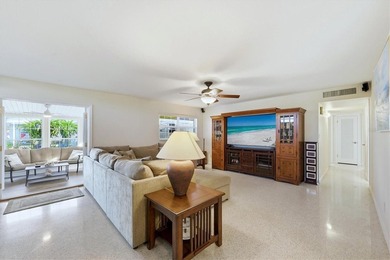 Pride of ownership shines in this well-maintained 1961 on Deep Creek Golf Club in Florida - for sale on GolfHomes.com, golf home, golf lot