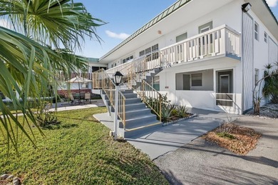 LIVE THE FLORIDA LIFESTYLE IN THIS 1 BED/1 BATH UNIT ON A PALM on Eco Golf Club in Florida - for sale on GolfHomes.com, golf home, golf lot
