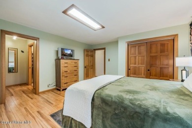 This impeccably maintained Priest Lake home perfectly blends on Priest Lake Golf and Tennis Club in Idaho - for sale on GolfHomes.com, golf home, golf lot