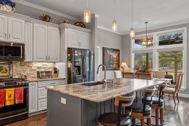 Custom-built beauty overlooking the 11th green of Granada Golf on Granada Golf Course in Arkansas - for sale on GolfHomes.com, golf home, golf lot