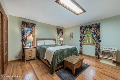This impeccably maintained Priest Lake home perfectly blends on Priest Lake Golf and Tennis Club in Idaho - for sale on GolfHomes.com, golf home, golf lot